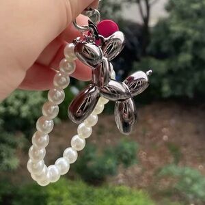 Silver Balloon Dog Pearl Bracelet Keychain with white faux pearl Wristlet